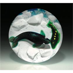 William Manson 1981  Arctic Encounter  paperweight, containing a dark, teal-blue, aventurine sea...