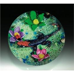 Caithness Glass 1984 "Fire Lizard" paperweight, with a reptile of dark blue aventurine, having a...