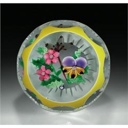  J  Glass double overlay pansy paperweight, with a purple and yellow pansy, two pink flowers with...