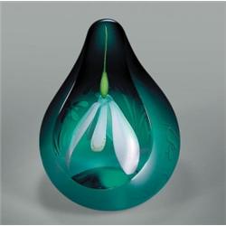 Caithness Glass "Spring Sentinel" teardrop-shaped floral paperweight, containing a central white...