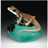 Image 1 : Orient & Flume rock relief paperweight, with a three-dimensional greenish-brown lizard, resting...