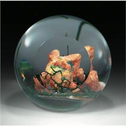 Andrew Fote "Cat in the Grass" spherical paperweight, with a three-dimensional sculpture of a go...