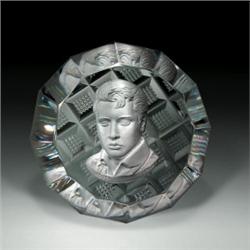 D'Art D'Amilly Elvis Presley sulphide paperweight, with the likeness of a "young Elvis" on clear...