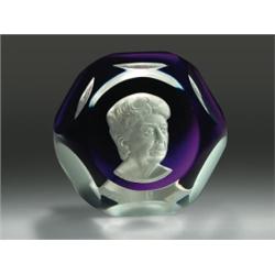 Baccarat 1971 Eleanor Roosevelt sulphide paperweight, with a white cameo on translucent amethyst...