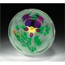 Chinese pansy paperweight, with a purple and pale yellow pansy, having a yellow and red millefio...