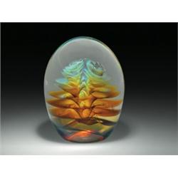 Michael O'Keefe 1984 oblong high-domed abstract design paperweight, containing a pair of silver-...