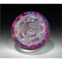 Selkirk Glass "Spellbound" abstract design paperweight, with a central bubble and an air ring abo...