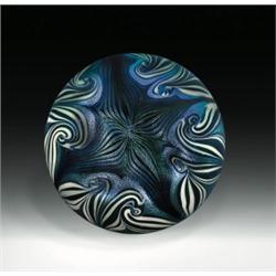 Orient & Flume 1974 abstract patterned surface design paperweight, with a Tiffany-style feather p...