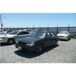 98 Toyota Corolla 4 Dr  Sedan - T/SR - `DRIVE