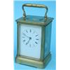 Image 1 : A French carriage clock, striking on bell, having enamelled Roman dial, in gilt brass case, W 3.5...