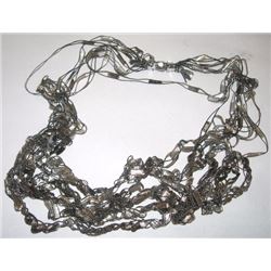 Beautiful hand-knitted long black and white necklace