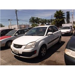 06 Kia Rio 4dr Sedan (1.6L I4 5M) - T - `DRIVE
