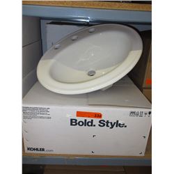 2 New Kohler porcelain bathroom sinks