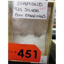 .925 Silver Bow Earrings each set with a Diamond