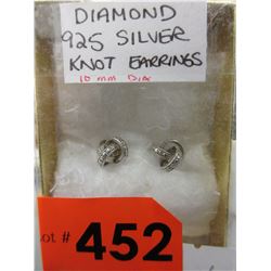 .925 Silver knot earrings set with a diamond