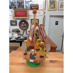 Folk art spinning toy - fishing motif