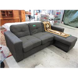 Upholstered sofa with chaise end - store sample