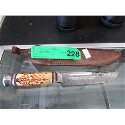 Vintage hunting knife with leather sheath