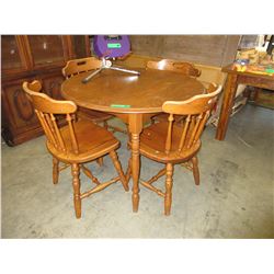 Used round wood dining table with 4 chairs