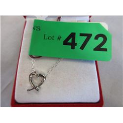 Sterling Silver Heart Necklace set with a Diamond