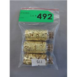 3 Vials of gold leaf.