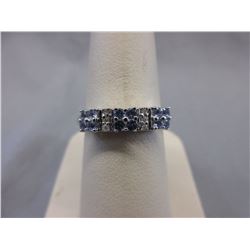 Fancy Tanzanite ring set with 6 Diamonds