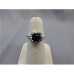 Sterling Silver & Garnet ring set with a Diamond