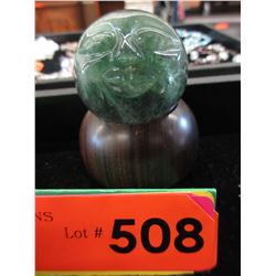 Carved crystal "Moon faced" orb