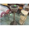 Image 1 : STANDING PEDISTAL WICKER PLANT STAND