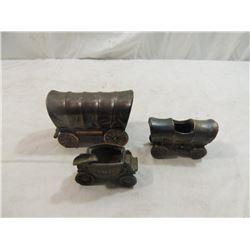 LOT 3 BRONZE? COVERED WAGON FIGURES