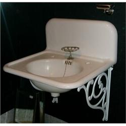 Iron Sink on Brackets, This cast iron sink with molded back splash measures 24" x 20" and sits...