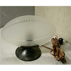 Unusual Football Desk Light, The etched and cut glass football measures 10" x 7" and sets in a...