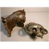 Image 2 : Two, Pieces of Fancy Iron, The animal figure holding the large object in its mouth is from a...