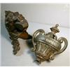 Image 4 : Two, Pieces of Fancy Iron, The animal figure holding the large object in its mouth is from a...