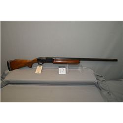 Remington Mod 1100 Trap .12 Ga 2 3/4" Semi Auto Shotgun w/ 30" vent rib bbl [ blue finish, some slig