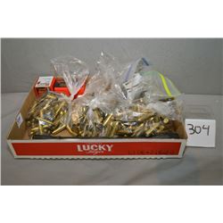 Tray Lot : .6 MM bullets - .45 Auto cal brass - .30-06 brass - various other caliber brass - Weaver 