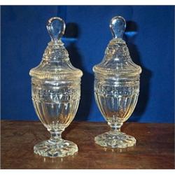 A PAIR OF FLAT CUT PRESERVE JARS AND COVERS, 19th CENTURY, with lobed finials and facetted bodies...