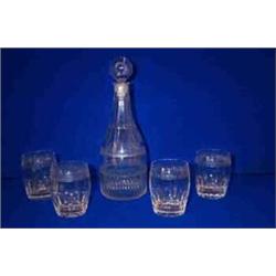A TAPERING DECANTER, SCOTTISH, c.1780, fluted cut, two double incised neck rings, two horizontal...