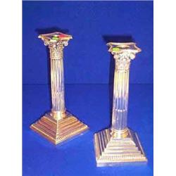 a pair of corinthian column candlesticks, sheffield 1939, Walker & Hall, on stepped beaded base a...