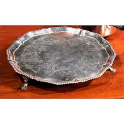 A SHAPED SALVER, LONDON 1765, Crouch & Hannan, with gadrooned rim, the centre engraved with flowe...
