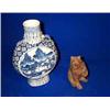 Image 1 : A BLUE AND WHITE CHINESE MOON FLASK, 19th CENTURY; and a Bavarian carved bear (2)., £30/50...