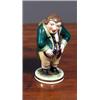 Image 1 : A BLOOR DERBY FIGURE OF A GENTLEMAN, EARLY 19th CENTURY, with a pot belly, colourfully dressed in...