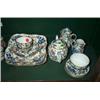 Image 1 : AN ENGLISH PART TEASET, 19th CENTURY, decorated with summer flowers, consisting of a teapot; a ho...