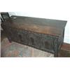 Image 1 : AN OAK COFFER, 17th CENTURY, with planked top, the panelled front with stylised arches and fretwo...