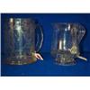 Image 1 : AN ENGRAVED SODA GLASS TANKARD, PROBABLY DUTCH, c.1710, decorated with Baroque architectural trel...
