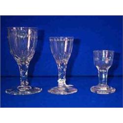 TWO FACET STEMMED ENGRAVED WINE GLASSES, c.1780, 13cms and 15cms high; and a fine mid 18th Centur...