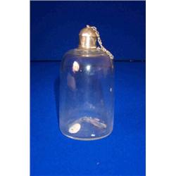 A LEAD GLASS FLASK, PROBABLY ENGLISH, c.1710, with silver rim and chained stopper., £200/300...