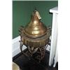 Image 1 : A TURKISH BRASS BRAZIER AND STAND; and another., £200/300...