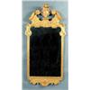 Image 1 : a pair of carved giltwood mirrors, c.1720, the broken swan neck pediments filled with a cartouche...