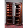 Image 1 : A near PAIR OF STAINED WOOD OPEN BOOKCASES, supplied by John McArevey of Newry, on moulded cornic...